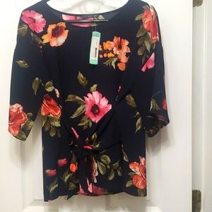 Navy floral print blouse with front tie. Medium size